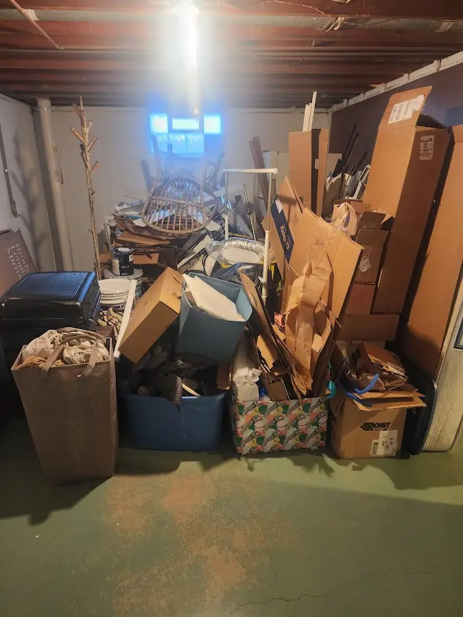 Roll-off dumpster container at job site for Roll Off Dumpster Rental in Madisonville